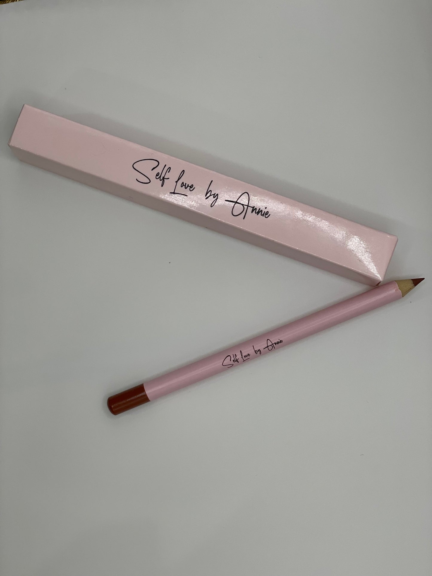 Annie’s shade 22 - Brown Sugar Lip Pencil.