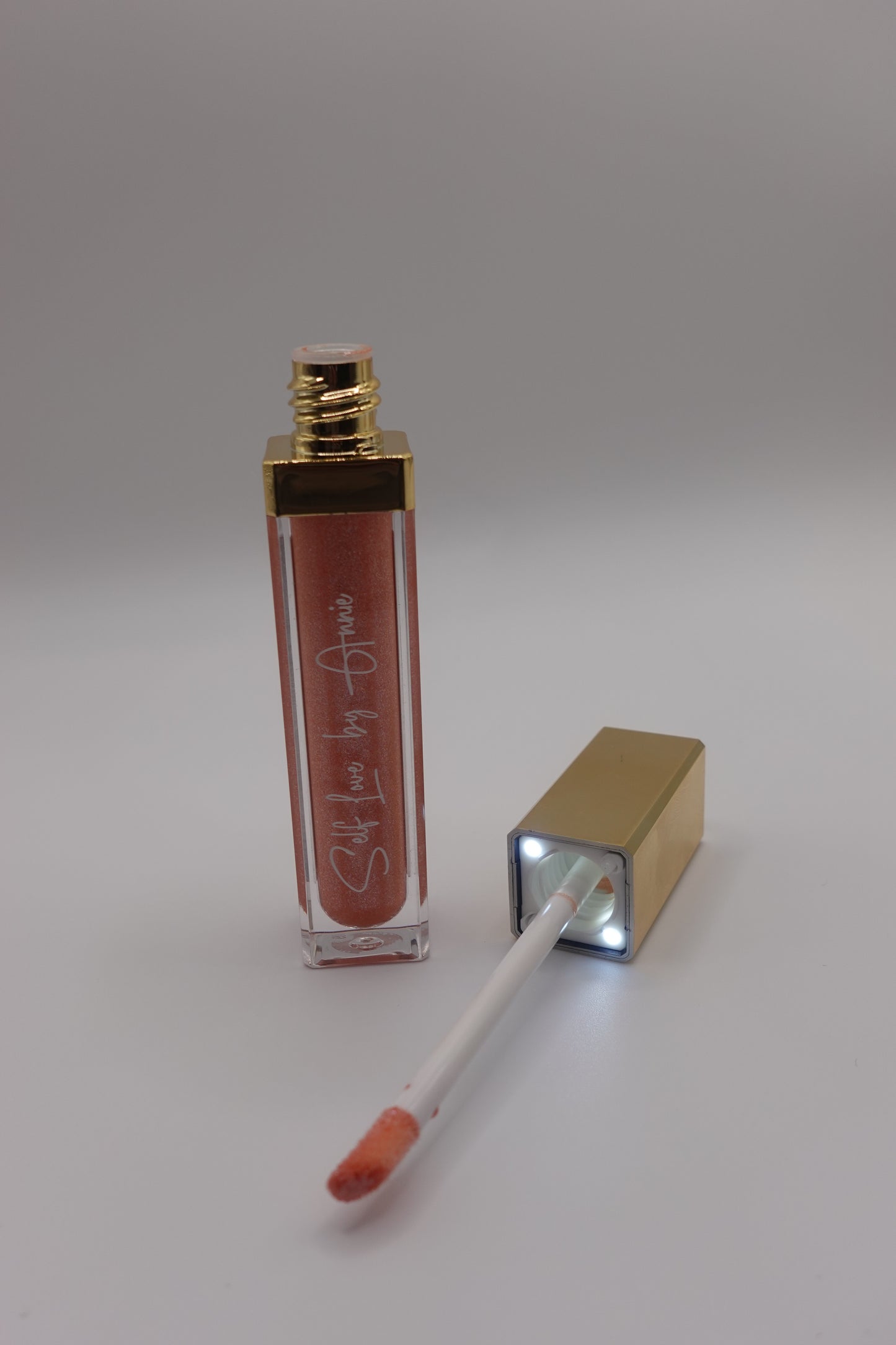 Popular Gloss with built-in light and mirror